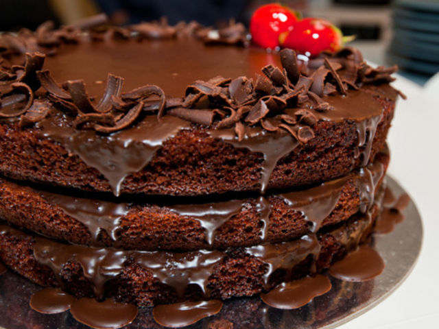 15. This stack of thin chocolate cakes with sweet moist chocolate oozing out of it tastes better than love feels. 