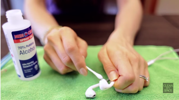 A cotton swab dipped in alcohol breaks down wax (ew) on the exterior.