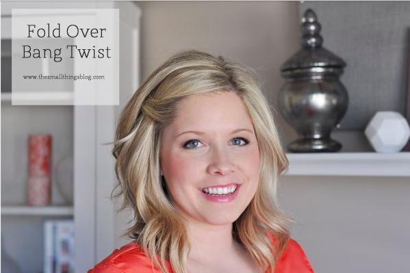 Sweep bangs to the side with an easy twist + two tucked-away bobby pins: