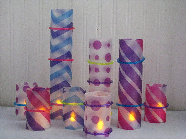 Use battery-operated "flames" and transparent folders to create these lifelike candles.