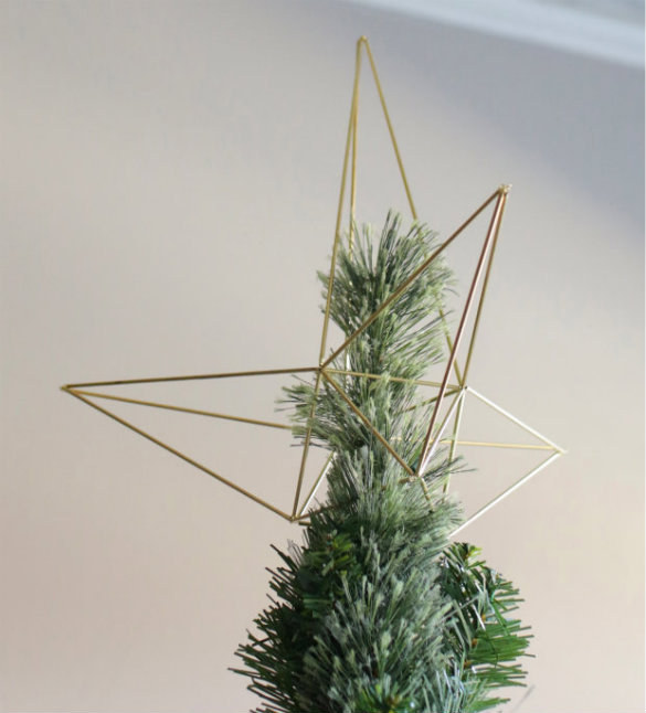 Top your tree with this sleek geometric star.