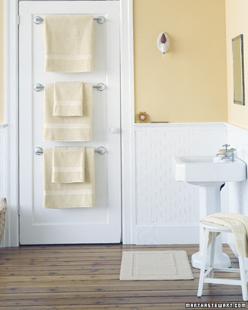 15. Install multiple towel rods on the back of your door. 